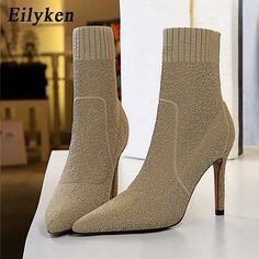 Overview: Unique design, stylish and beautiful. Good material, comfortable feet. A variety of colors, any choice. Specification: Upper material: wool Sole Material: Rubber Applicable gender: female Style: fashion Color: black, khaki, wine red Sizes: 35, 34, 36, 37, 38, 39, 40 Heel height: super high heel (above 8CM) Package Content: 1 pair x shoes Winter Boots Women Fashion, Simple Winter Fashion, Boots Fall Ankle, Designer Ankle Boots, Cheap Ankle Boots, High Heels For Women, Autumn Shoes Women, Large Size Womens Shoes, Stretch Boots