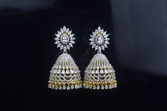 Most beautiful Gorgeous fully American Diamond embedded Jhumkas with Push. Back style.  This  stone are with  sparking shine gives a unique look Luxury Bollywood Style American Diamond Jhumkas, Luxury Bollywood Style Pearl Drop Jhumkas, Closed Setting Diamond Jhumkas, Luxury American Diamond Bridal Earrings For Diwali, Luxury Fusion Style Cutdana Jhumkas, Luxury Diamond Jhumkas As Gift, Bollywood Style Diamond Jhumkas, Diamond Jhumkas Indian, Diamond Jumkas