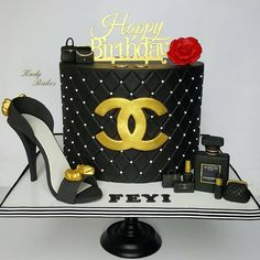 a chanel birthday cake with high heel shoes and lipstick