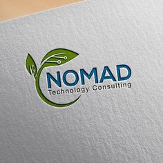 the nomad technology consulting logo is shown on a white paper with green leaves and scissors