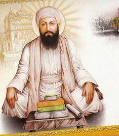 an image of a man with a beard sitting in front of books and holding a book