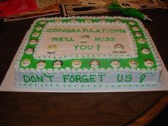 a cake that is sitting on a table with congratulations written on the top and below it