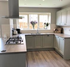 the kitchen is clean and ready for us to use in its new owner's home