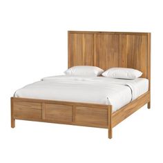 a bed with white sheets and pillows on it's headboard is made from wood