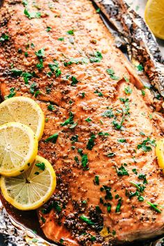 salmon with lemons and chives on foil