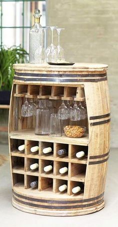 a wine rack made out of an old barrel