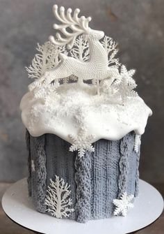 a frosted cake with white icing on top