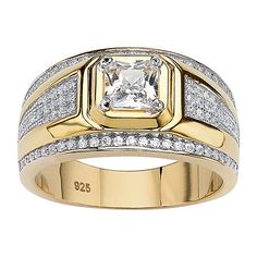 a gold ring with a square cut diamond surrounded by small white and clear cubics