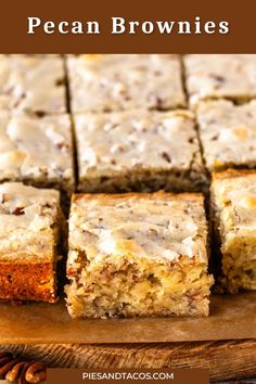 pecan brownies cut into squares on top of a cutting board with pecan nuts