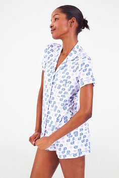 Add a fresh update to your polo sleepwear with our Moby the Whale print! This new version of the original Moby print is designed to bring an updated cult classic to your pajama drawer. Featuring shorts and a matching short-sleeve button-up top, this Pima cotton pajama set is made for a breezy feel on those warmer nights. Button Front Closure Functional Breast Pocket Contrast Piping Detail Mid-Rise Elastic Waist Materials and Care 100% Premium Cotton Machine Wash Cold, With Like Colors Do Not Ble Sleepover Bag, Cotton Pajama Set, Womens Dress Tops, Whale Print, Roller Rabbit, Casual Tunics, The Whale, Cotton Pajama Sets, Baby Pajamas