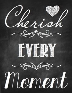 a chalkboard sign that says cherish every moment