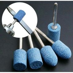 four blue sponges are being used to make drill heads