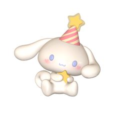 a white stuffed animal with a party hat on