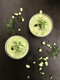 two bowls filled with cucumber and dill garnish