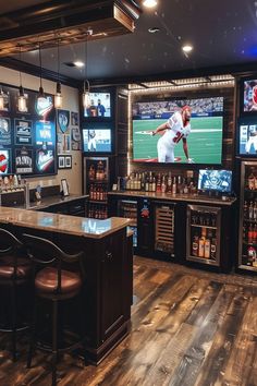 a sports bar with several televisions on the wall