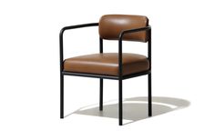 a brown leather chair with black frame and armrests on an isolated white background