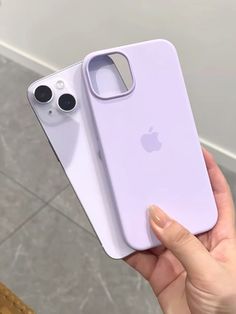 a person holding up an iphone case in their hand, with the back cover partially open