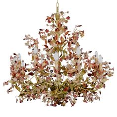 a chandelier with many flowers hanging from it