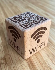 a wooden block with the word wifi printed on it