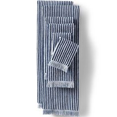 the blue and white striped towel is folded up