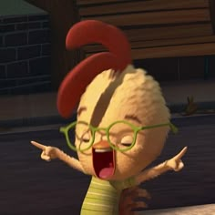 the animated character is wearing glasses and pointing to something with his mouth wide open while standing in front of a brick wall