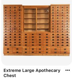 a large wooden cabinet filled with lots of drawers