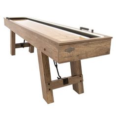 a wooden table with an air hockey board on it's legs and one leg up