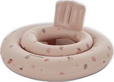 an inflatable chair with seashells on it