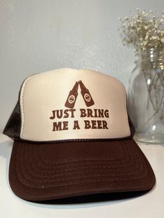 This absolutely adorable trucker hat is the perfect addition to your hats or a great gift for loved one! All items are handmade to order :) What's included?  brown trucker hat with brown bring me a beer design  This hat has adjustable back strap so it fits most! Find more from us on our NEW website bashdesignsco.shop Brown Trucker Hat, Beer Design, Cool Items, Back Strap, Trucker Cap, It Fits, Caps Hats, Trucker Hat, Accessories Hats