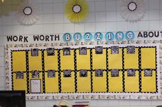 a bulletin board with the words work worth, buzzzing about and pictures on it