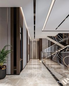 an elegant hallway with marble flooring and walls, along with glass balconies