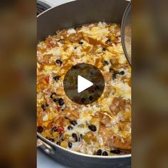 a pot filled with food sitting on top of a stove