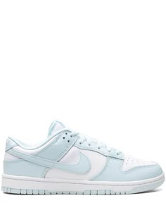 These Nike dunk low sneakers feature a signature Swoosh logo detail, an embroidered logo to the rear, a round toe, a front lace-up fastening, a logo patch at the tongue, a branded insole, and a rubber sole. They are low top and athletic. Glacier Blue Dunks, Cute Preppy Shoes, Pastel Dunks, Popular Shoes For Teens, Light Blue Dunks, Women Nike Dunks, Nike Dunks Women, Baby Blue Sneakers