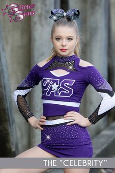 a girl in a purple cheer uniform posing for the camera with her hands on her hips