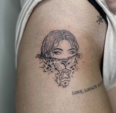 a woman's arm with a tattoo on it that says love, i don't think