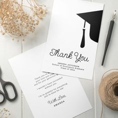 two thank you cards with a graduation cap on them next to twine of twine