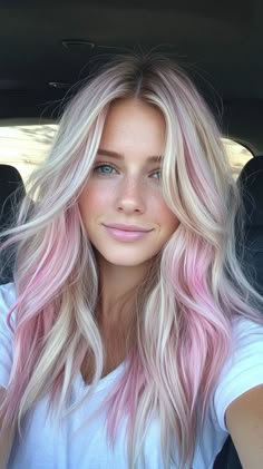 Add a bold touch with magenta pink tips that stand out on tan skin. Visit our page for tips on achieving this vibrant look. Save this pin for hair tip ideas! Tags: #MagentaPinkTips #HairColor #TanSkin Pink Pieces In Blonde Hair, Blonde Hair With Pale Pink Highlights, Cute Hairstyles Dyed Hair, Blonde Hair Colored Ends, Pink Hair Accents, Light Pink Money Piece Hair Blonde, Rooted Hair Color, Pink Pieces In Hair, Blonde Pastel Pink Hair