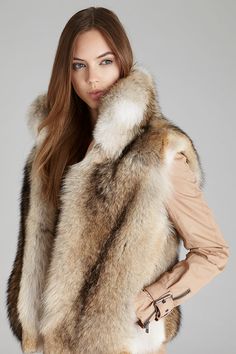 Layer our coyote fur vest with stand up collar over your fall sweater, denim jacket or winter coat for extra style and warmth. Stand up or fold down collar Slit pockets Satin lining Hook & eye closure Length: 22 in/55 cm Fur Chair, Girls Fur Coat, Fox Fur Vest, Fox Fur Jacket, Coyote Fur, Fabulous Furs, Fox Fur Coat, Collars For Women, Fur Fashion