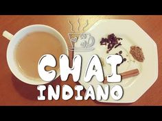 there is a cup of tea and some spices on the plate with the words chai indiano