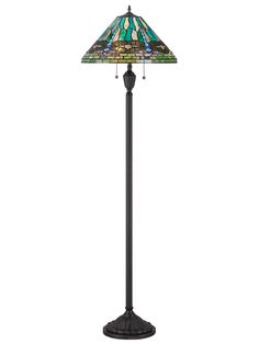 a floor lamp with a stained glass shade on the top and bottom part of it