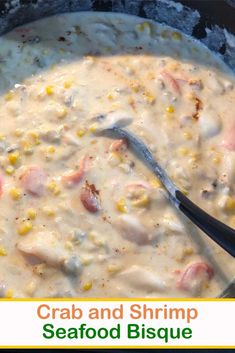 crab and shrimp seafood bisque in a cast iron skillet with a serving spoon