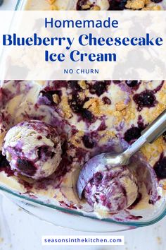 homemade blueberry cheesecake ice cream in a glass dish with a spoon on the side