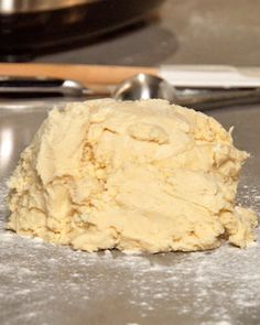 a scoop of dough sitting on top of a table