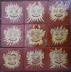 six tiles with sun faces on them in red and yellow colors, each depicting the same person's face