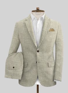 The distinctive heathered finish brings an eccentric flair to this classic style. Crafted from 100% linen, the Solbiati Barn linen Suit is surely a quintessential elegance with a contemporary twist. Team it up with a matching waistcoat, a crisp white shirt and tan shoes. 
 
 Look Includes  Solbiati Barn Linen Fabric  Two Button Jacket Style  Notch Lapel  Horn Brown Buttons  Single Vent  Three Cuff Buttons  Two Welted Back Pockets on Trousers   
 You can change the look during customization if re Single-breasted Linen Wedding Suits, Tailored Linen Three-piece Suit With Notch Lapel, Timeless Linen Single-breasted Suit, Timeless Single-breasted Linen Suit, Cream Linen Single-breasted Suit, Grey Tweed Suit, Green Velvet Jacket, Herringbone Tweed Jacket, White Linen Suit