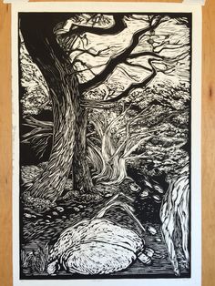 a black and white drawing of a tree in the woods with two ducks under it