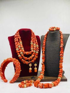 Handcrafted African Coral Beads Necklace - Unique Ethnic Jewelry for a Statement Look NEED OTHER DESIGNS OF BRIDE AND GROOM CORAL BEADS, AFRICAN PRE-TIED HEADWRAPS, BRAIDED WIGS AND AFRICAN GIFT ITEMS, VISIT OUR SHOP HERE: https://sereneafrica.etsy.com/ Materials: 1. Natural/Original African Coral bead 2. Gold color accessories  Features  This listing contains: 1. 3 layers of necklace, 2 bracelets, a set of dangling earrings and 1 broken coral beads head band for bride/woman. 2. 1 piece of neckl Elegant Orange Beads For Wedding, Elegant Orange Wedding Beads, Igbo Bride Traditional Weddings, Brides Accessories, Coral Accessories, Rich Gifts, African Wedding Jewelry, Black Dessert, Nigerian Beads