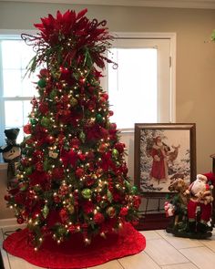 a decorated christmas tree in the corner of a room