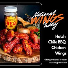 an advertisement for the national wings day with chicken wings and bbq sauce on a cutting board