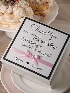 a thank you card sitting on top of a plate